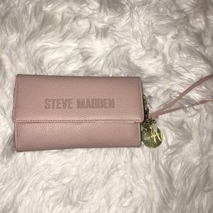 Steve Madden long wallet with wristlet attachment.